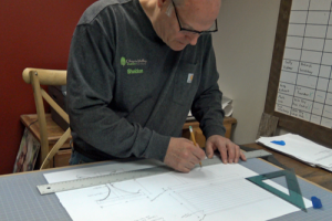 CVCF Founder Shel Myeroff In Action Drawing A Custom Furniture Design